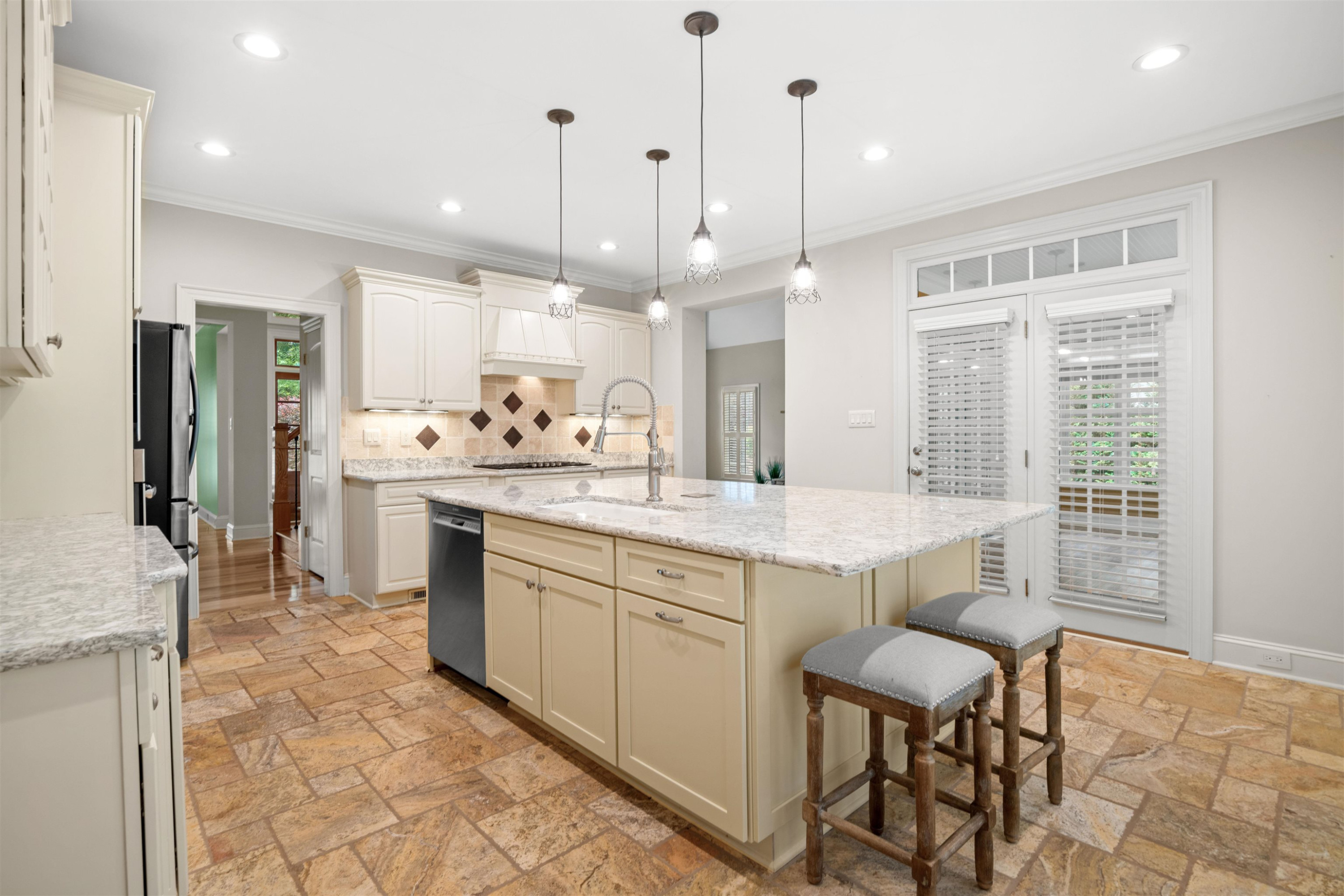20 Jackson Road Youngsville, NC 27596 - Photo 15 of 41 a kitchen with a sink and chairs