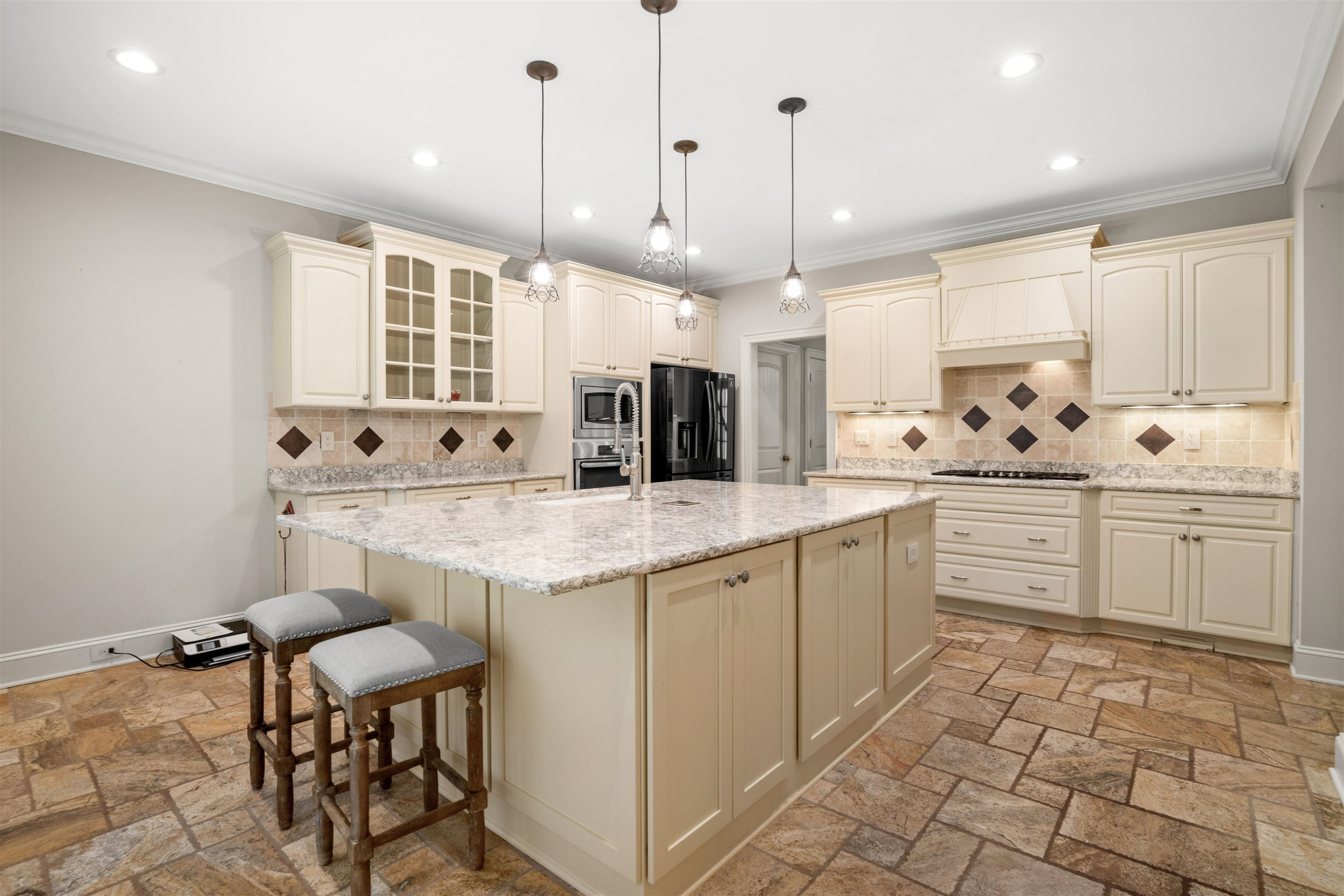 20 Jackson Road Youngsville, NC 27596 - Photo 17 of 41 a kitchen with granite countertop a sink and cabinets