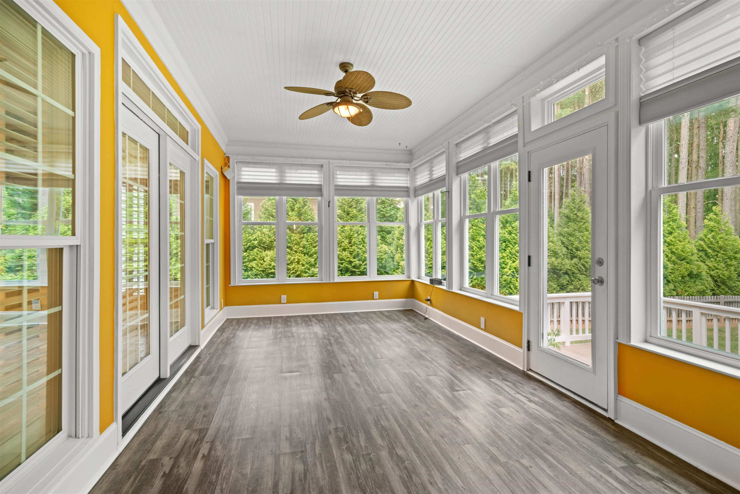 20 Jackson Road Youngsville, NC 27596 - Photo 18 of 41 a view of empty room with wooden floor and fan