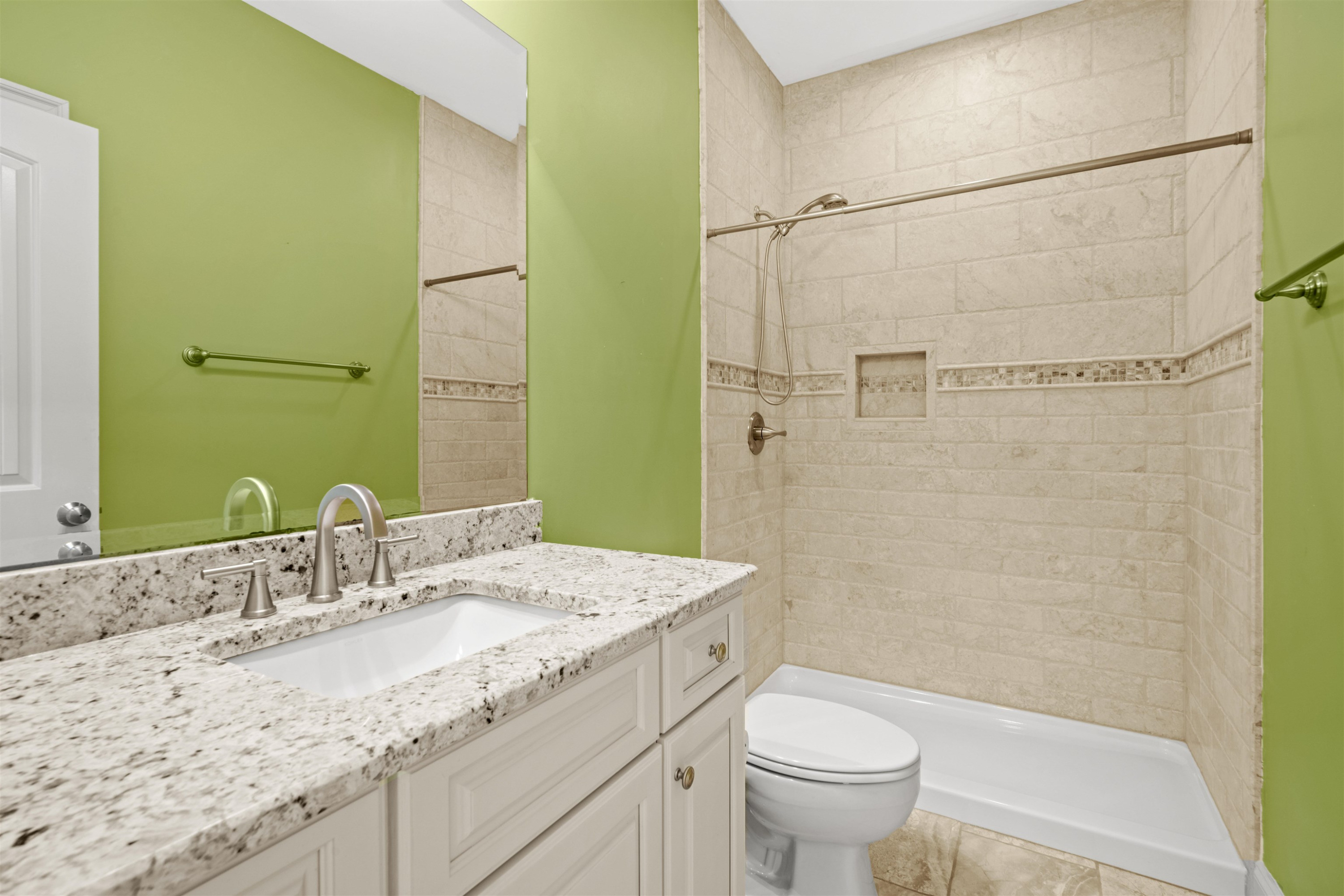 20 Jackson Road Youngsville, NC 27596 - Photo 25 of 41 a bathroom with a granite countertop sink toilet and shower
