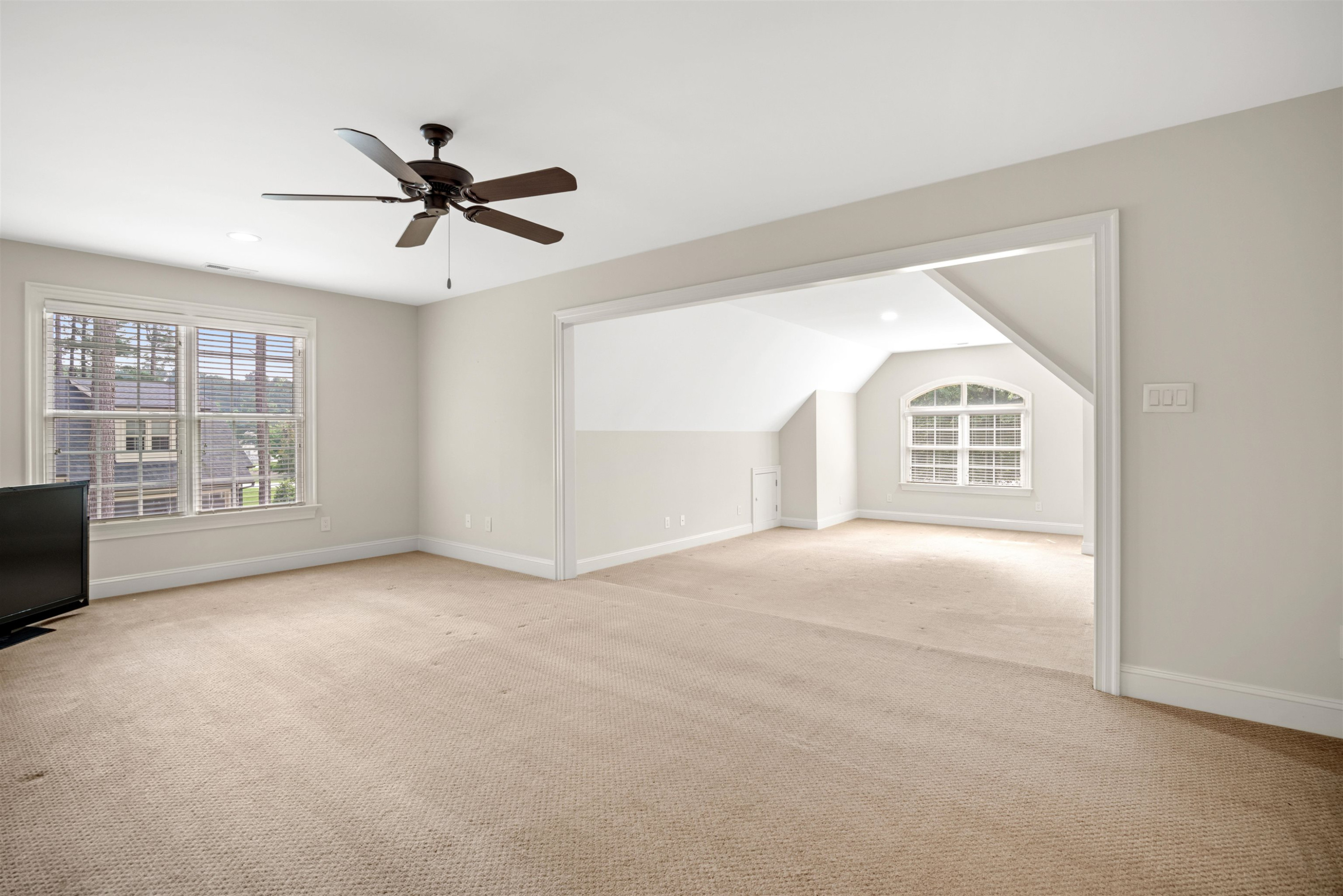 20 Jackson Road Youngsville, NC 27596 - Photo 30 of 41 a view of a livingroom with a ceiling fan and window