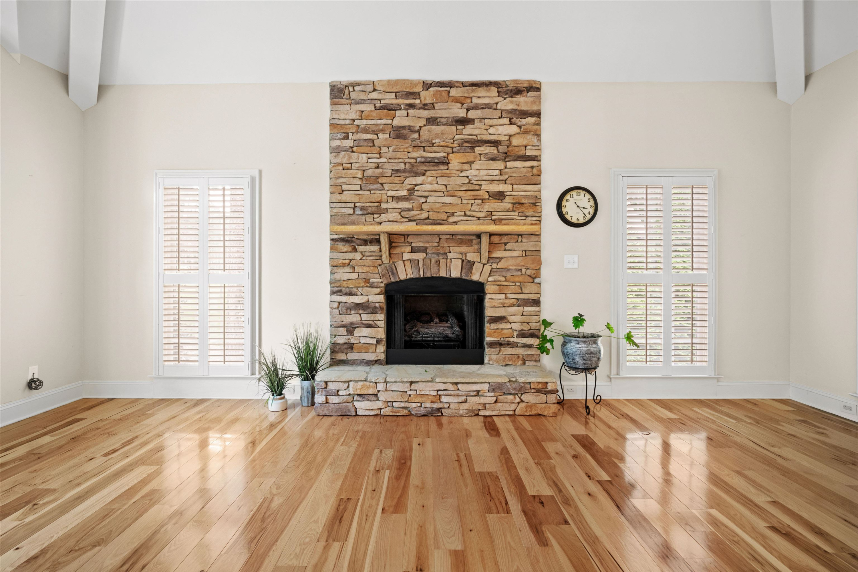 20 Jackson Road Youngsville, NC 27596 - Photo 8 of 41 an empty room with windows and fireplace