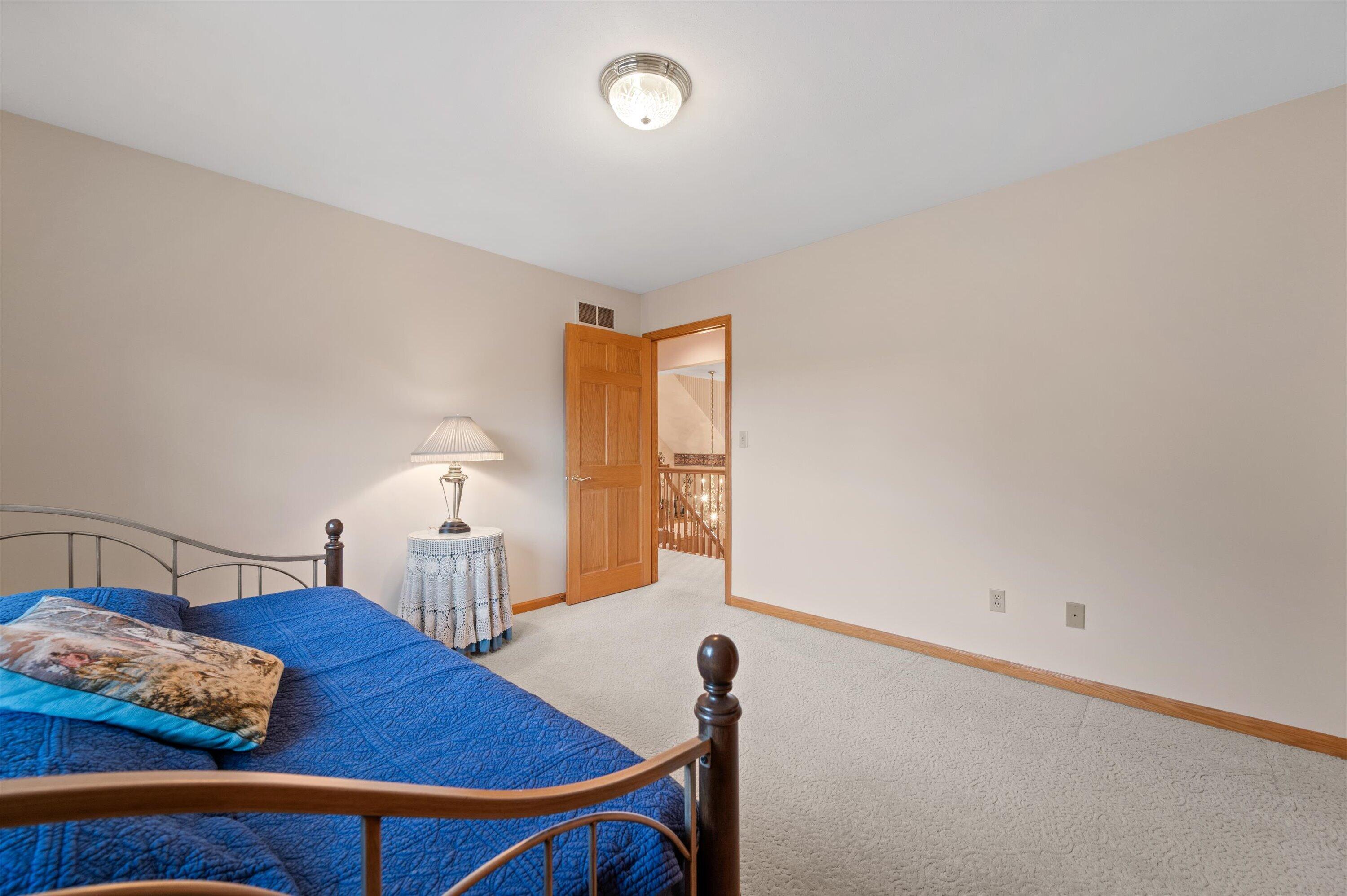 W299-n1828 Wind Ridge Court Delafield, WI 53072 - Photo 42 of 87 Bedroom 3