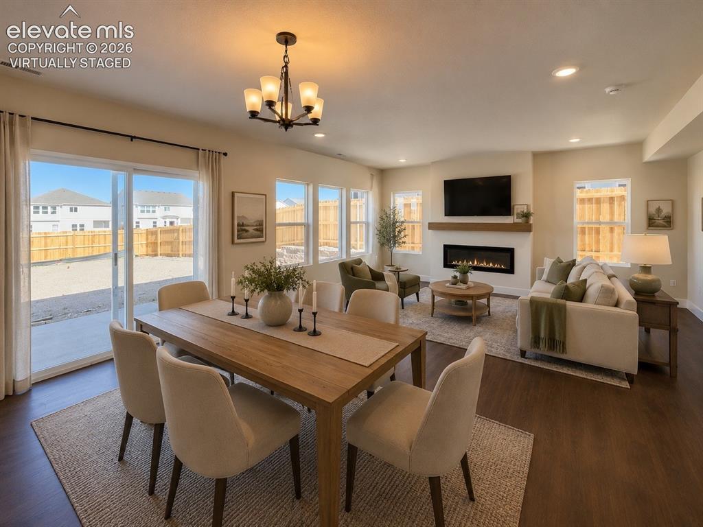 8206 Lemon Grass Road Peyton, CO 80831 - Photo 4 of 33 Virtually staged- Open concept dining/living room