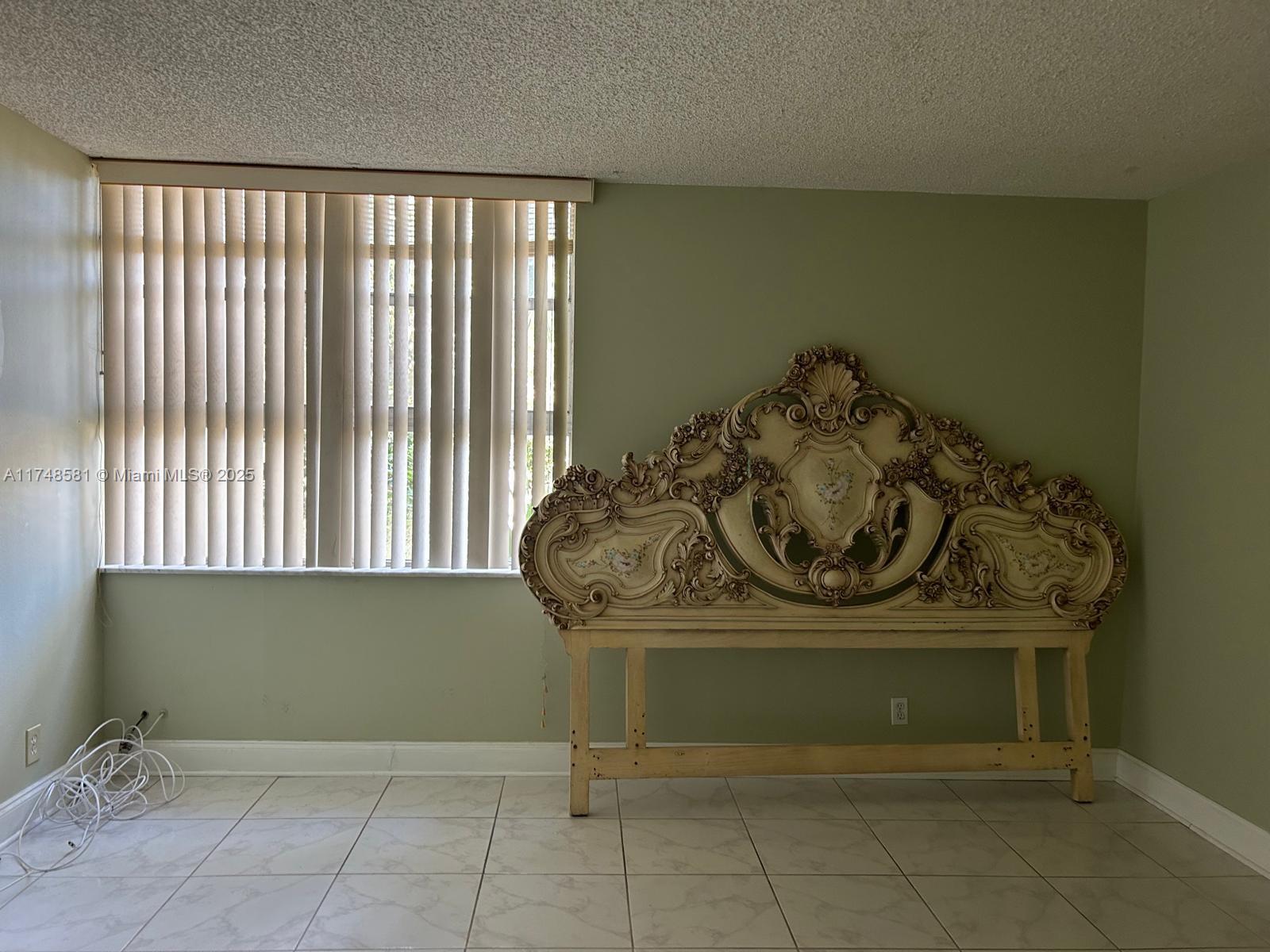 942 Northeast 199th Street, Unit 3E Miami, FL 33179 - Photo 13 of 31 a utility room with washer and dryer