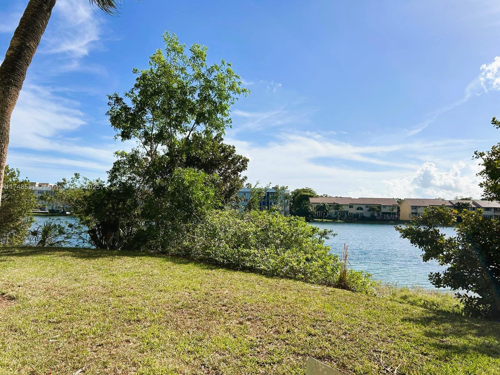 942 Northeast 199th Street, Unit 3E Miami, FL 33179 - Photo 30 of 31 a view of lake view and mountain view