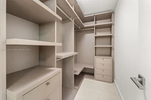 a room with storage and utility room