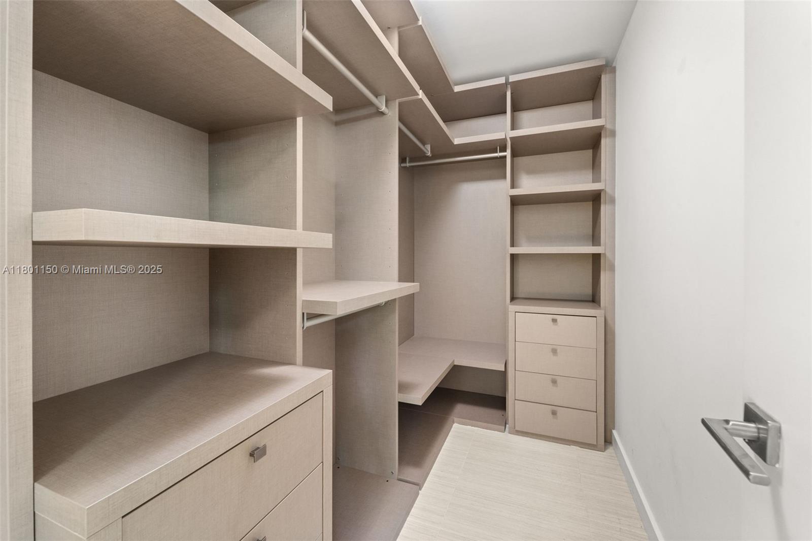 1 Collins Avenue, Unit 108 Miami Beach, FL 33139 - Photo 11 of 34 a room with storage and utility room