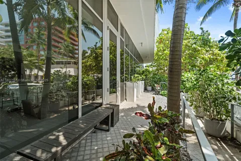 a view of balcony with furniture