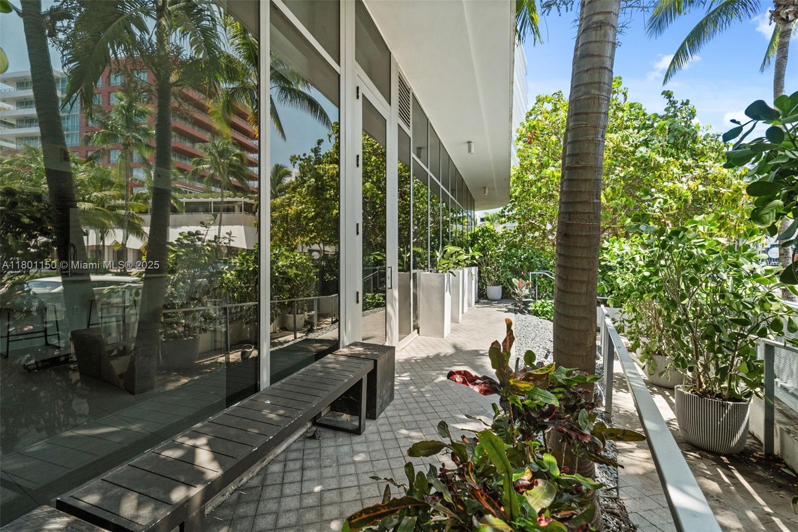 1 Collins Avenue, Unit 108 Miami Beach, FL 33139 - Photo 16 of 34 a view of balcony with furniture