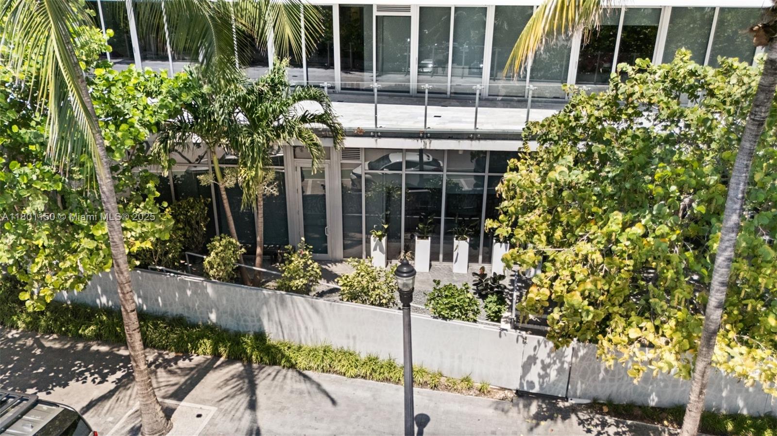 1 Collins Avenue, Unit 108 Miami Beach, FL 33139 - Photo 19 of 34 front view of a house