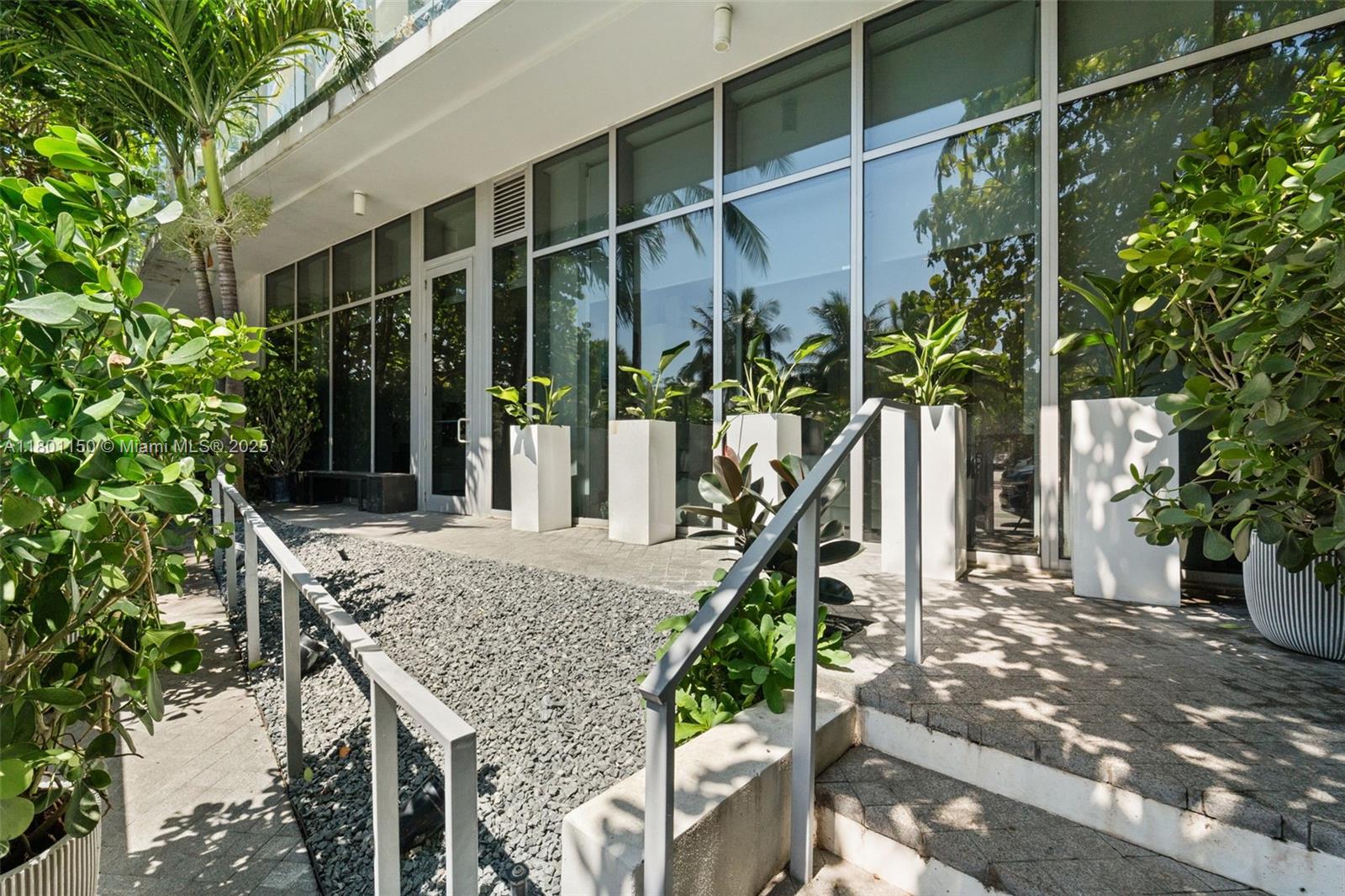 1 Collins Avenue, Unit 108 Miami Beach, FL 33139 - Photo 2 of 34 a house view with a outdoor space