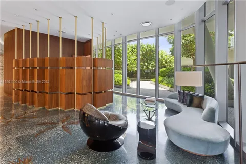 a room with gym equipment and view of gym equipment