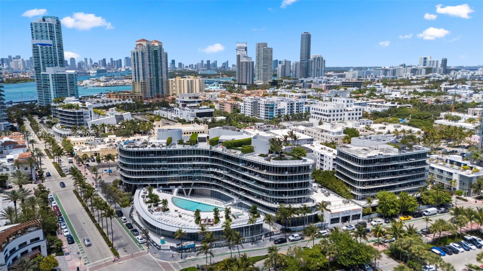 1 Collins Avenue, Unit 108 Miami Beach, FL 33139 - Photo 29 of 34 a view of a city with tall buildings