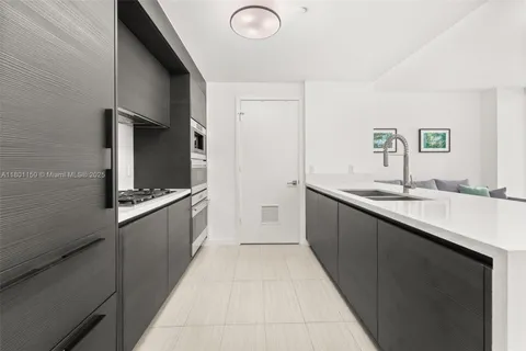 a large kitchen with cabinets