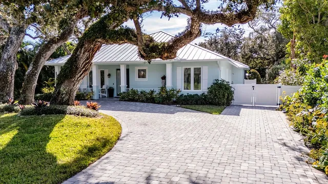 an aerial view of houses with yard