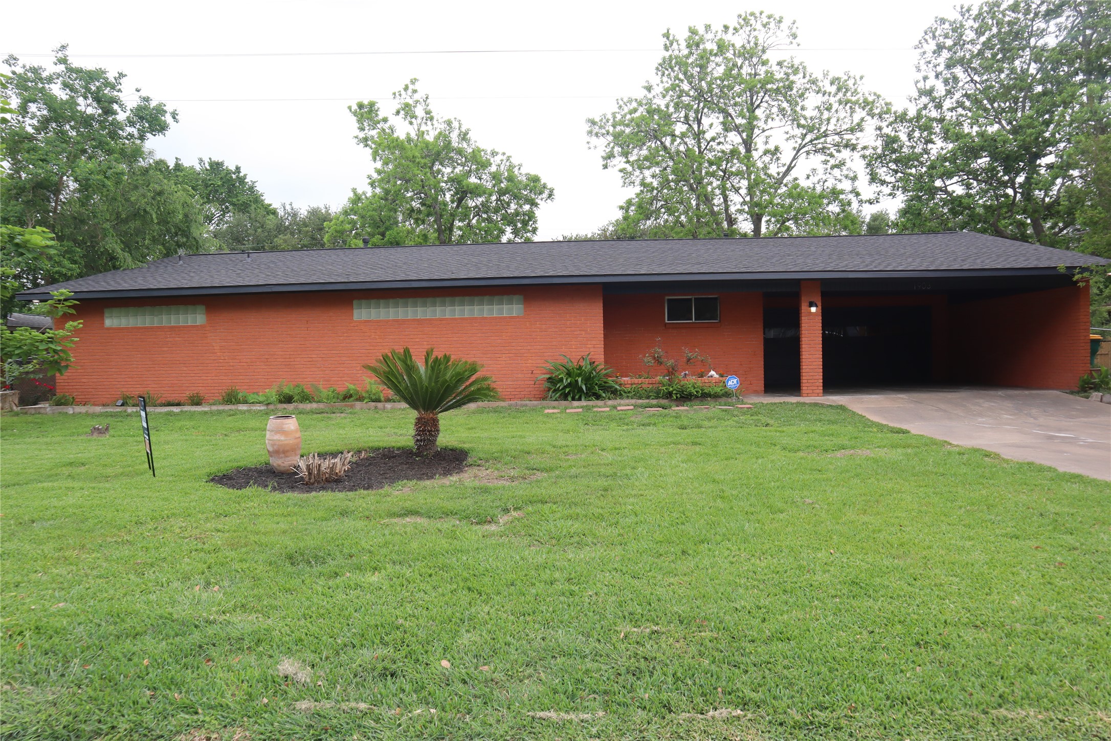 1903 Evergreen La Marque, TX 77568 - Photo 1 of 33 a view of a backyard with a garden
