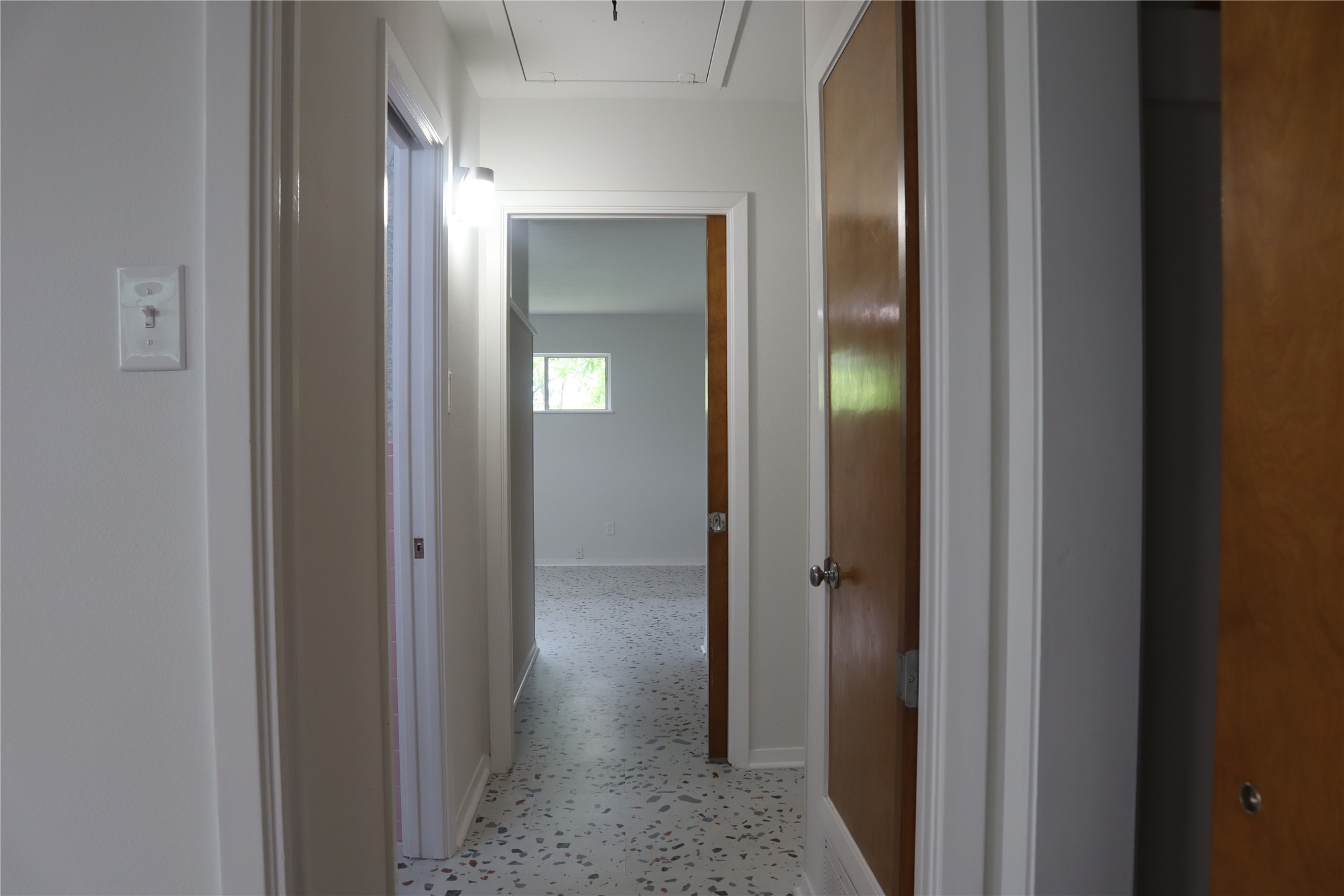 1903 Evergreen La Marque, TX 77568 - Photo 19 of 33 a view of a bathroom from a hallway with a bathroom