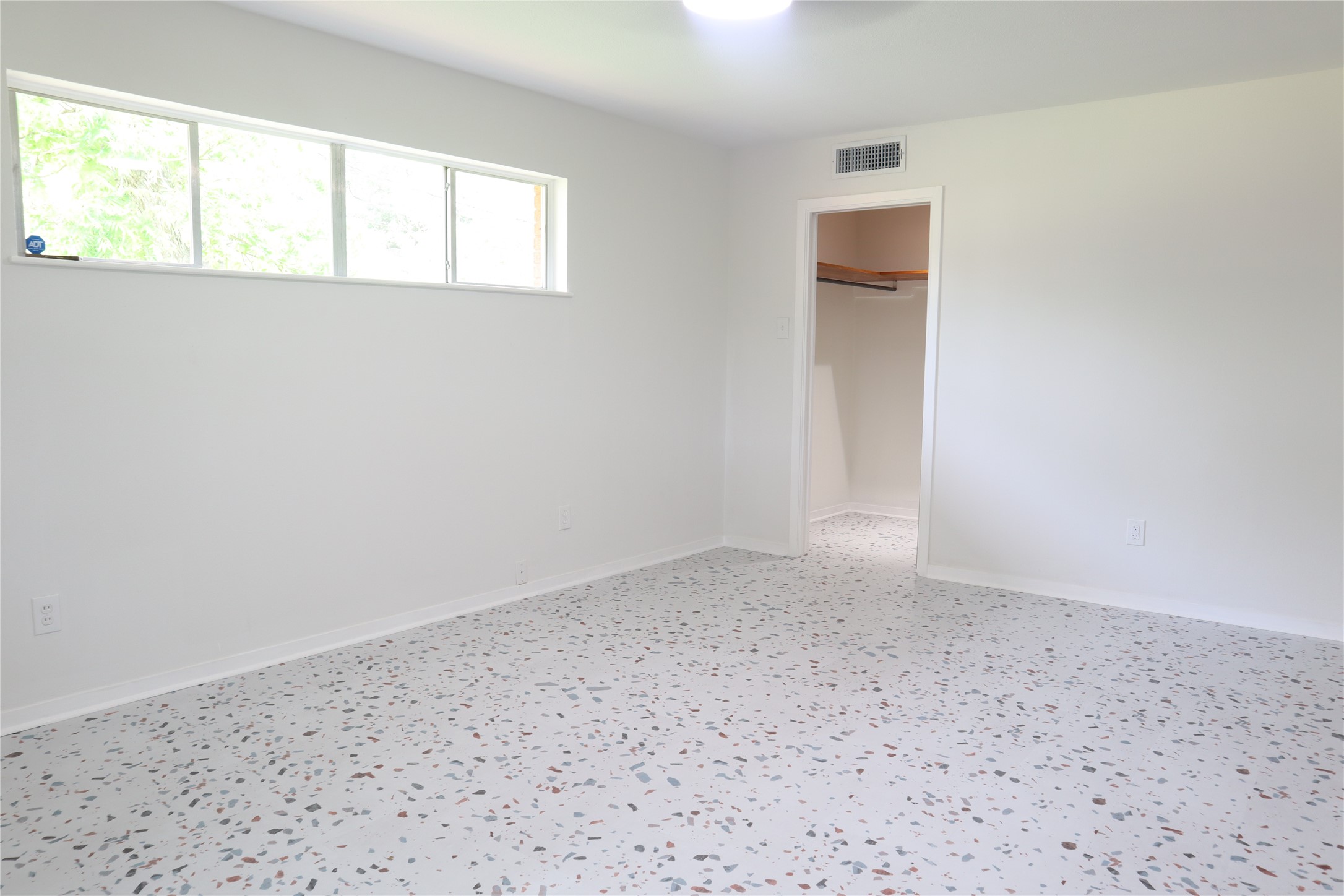 1903 Evergreen La Marque, TX 77568 - Photo 22 of 33 an empty room with a window