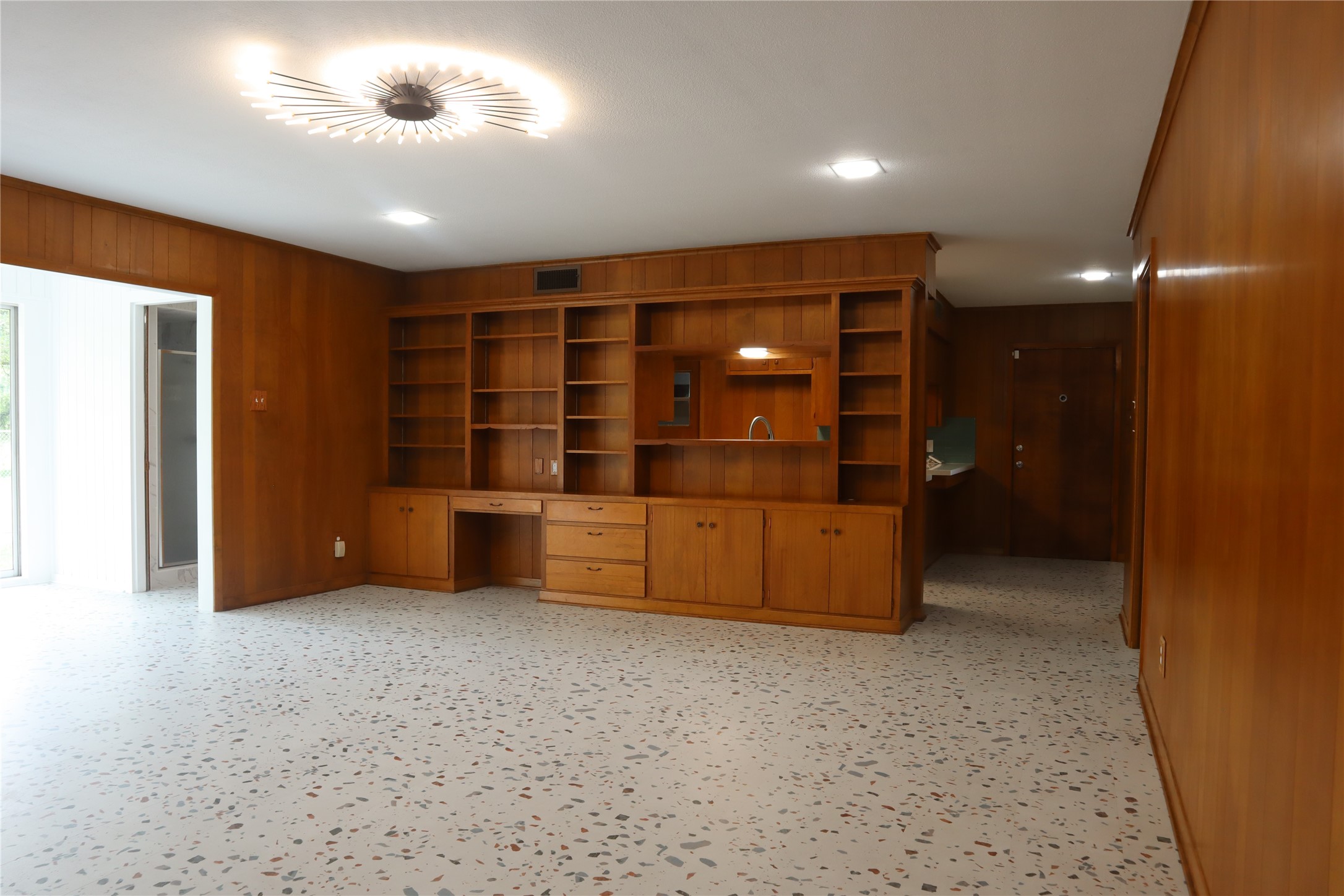 1903 Evergreen La Marque, TX 77568 - Photo 5 of 33 en empty room with furniture and natural light