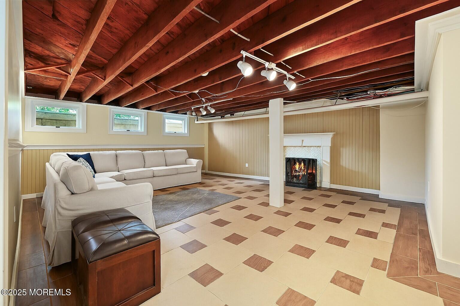 3 River Road Rumson, NJ 07760 - Photo 12 of 22 a view of a livingroom with furniture and a fireplace