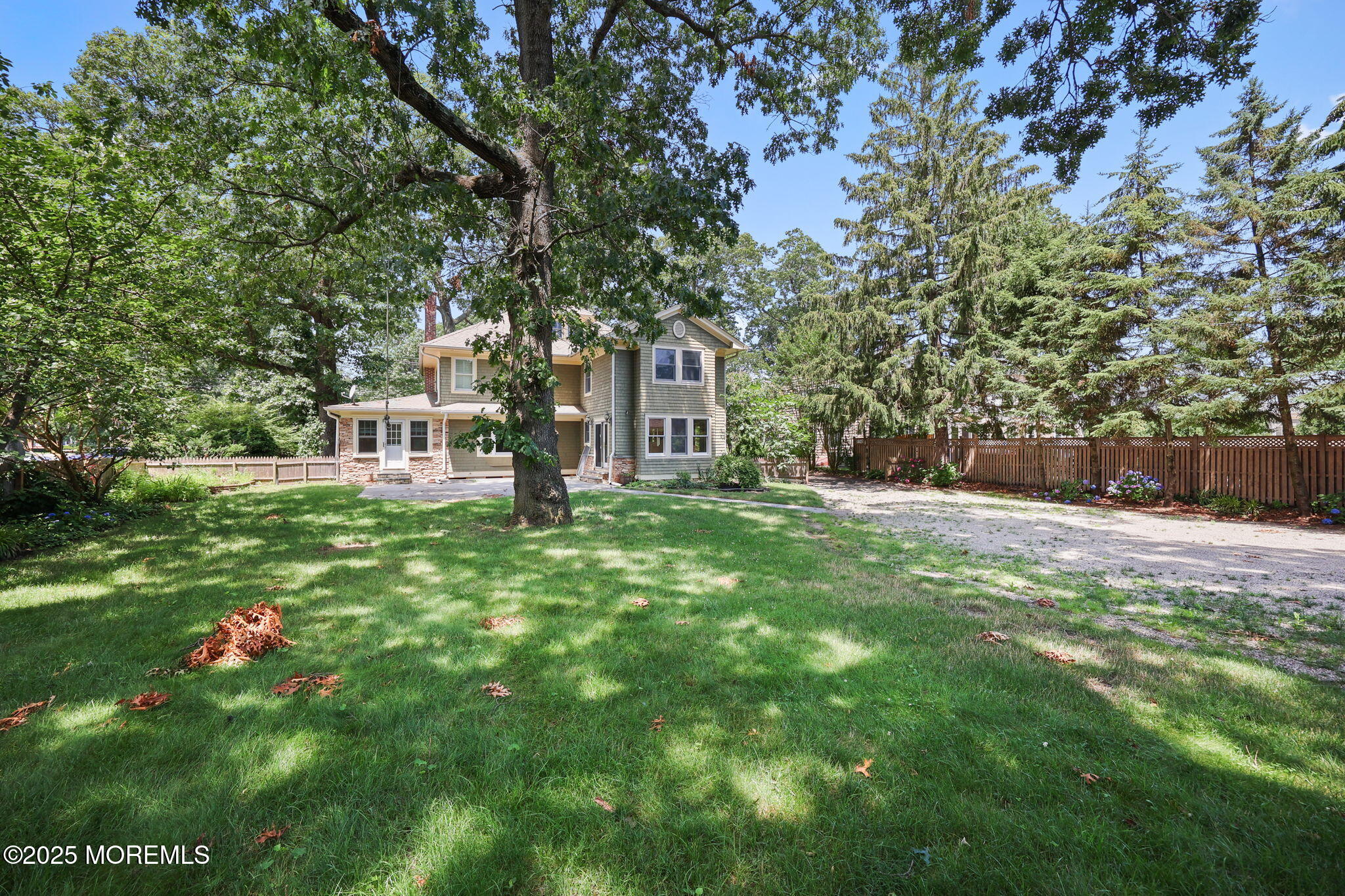 3 River Road Rumson, NJ 07760 - Photo 15 of 22 a view of a house with backyard and sitting area