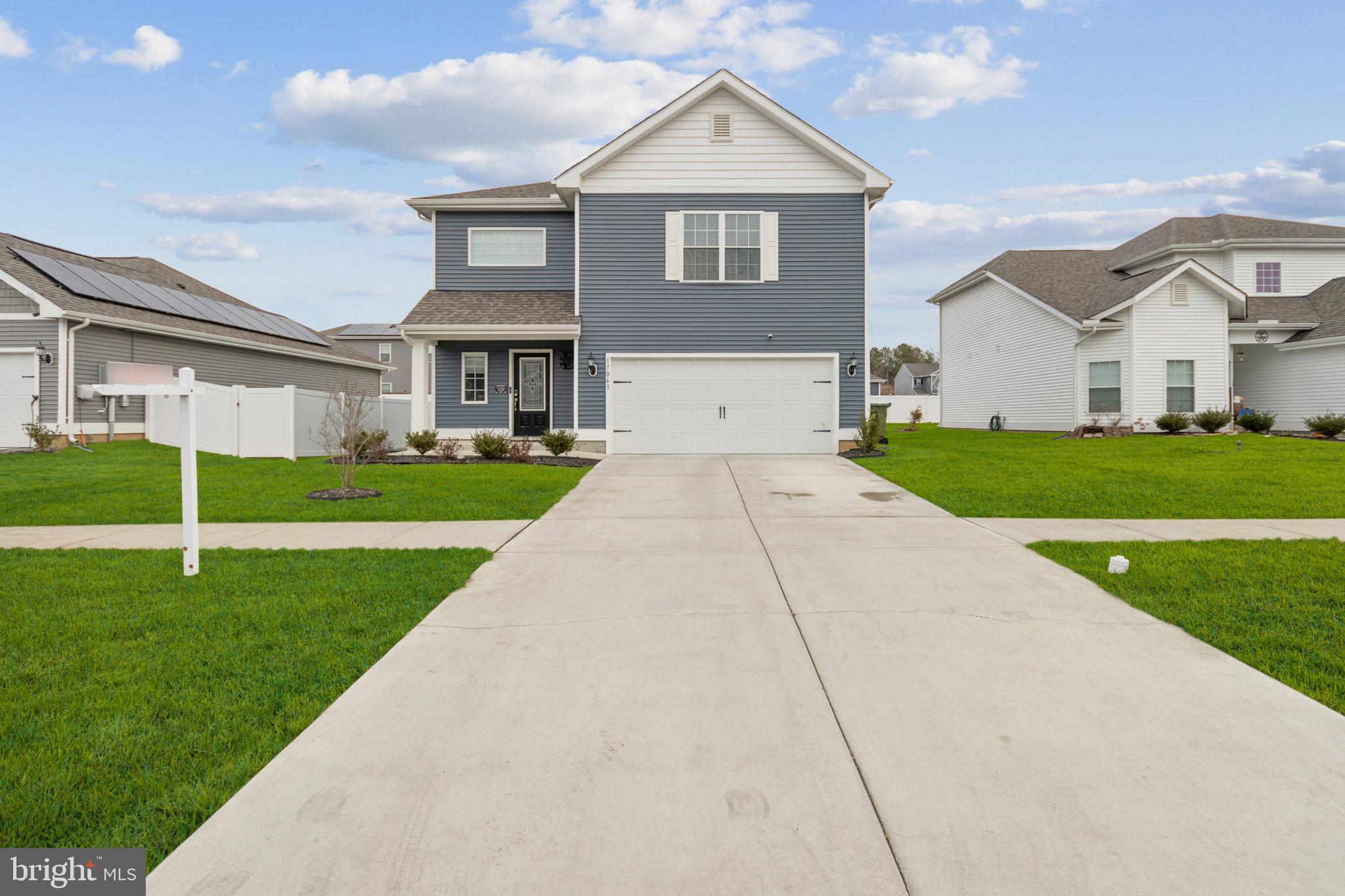 17063 Rollins Road Bowling Green, VA 22427 - Photo 1 of 40 a front view of a house with a yard