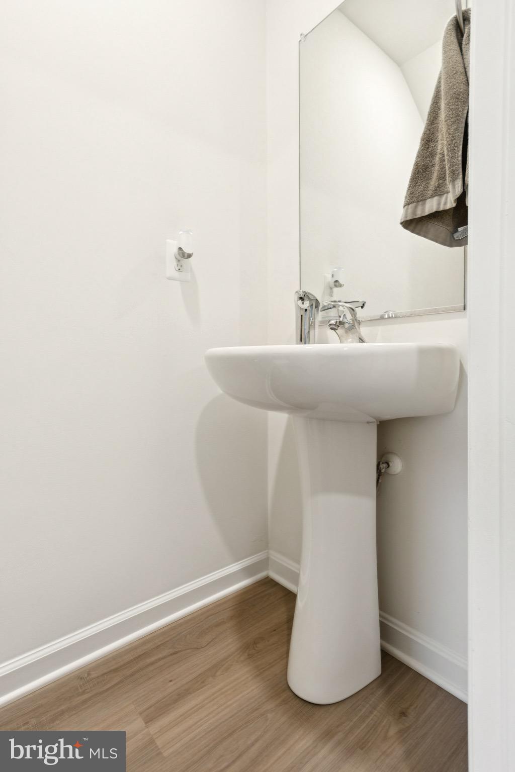 17063 Rollins Road Bowling Green, VA 22427 - Photo 17 of 40 a bathroom with a sink and a mirror