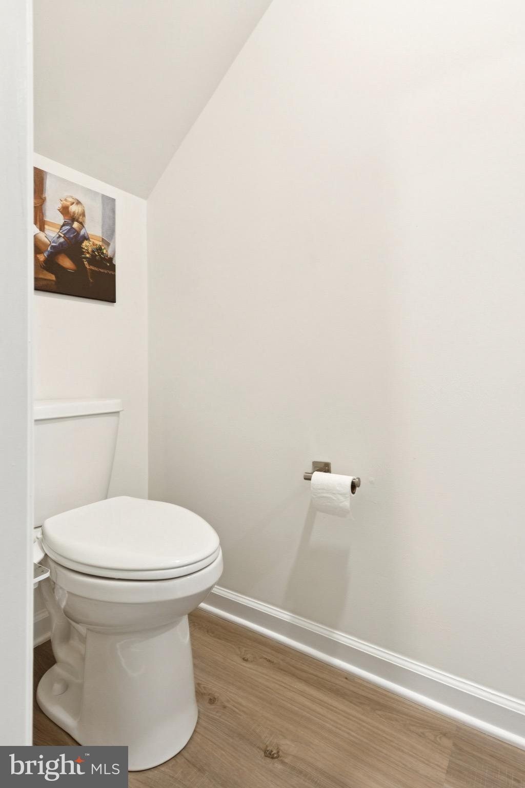 17063 Rollins Road Bowling Green, VA 22427 - Photo 18 of 40 a white toilet sitting next to a shower