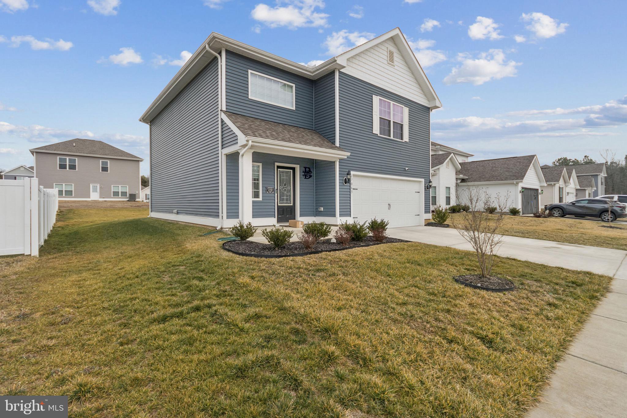 17063 Rollins Road Bowling Green, VA 22427 - Photo 2 of 40 a view of a house with a yard