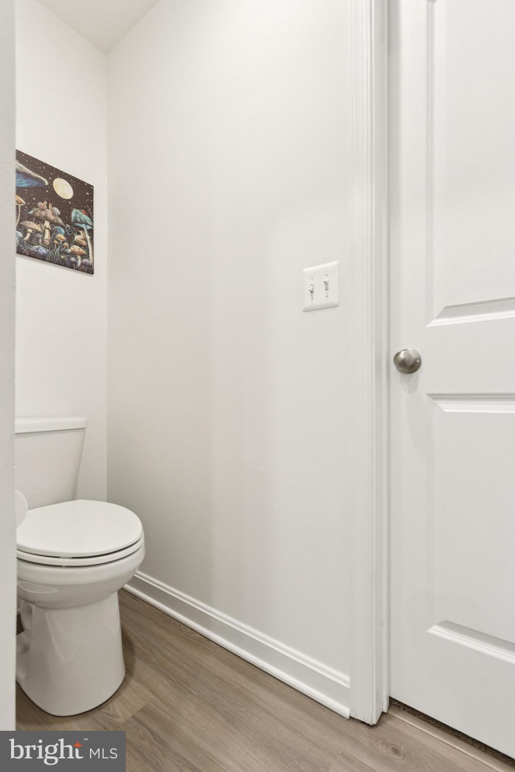 17063 Rollins Road Bowling Green, VA 22427 - Photo 27 of 40 a white toilet sitting next to a shower