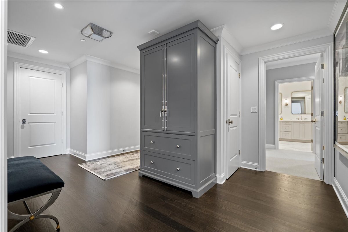 10 East Delaware Place, Unit 28E Chicago, IL 60611 - Photo 4 of 41 a view of an empty room and wooden floor