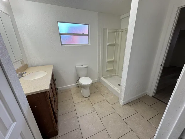 a bathroom with a sink and a toilet