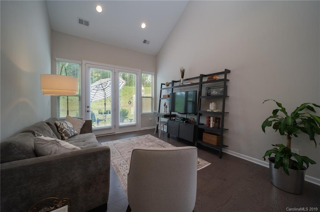 1002 Archibald Avenue Fort Mill, SC 29708 - Photo 14 of 26 a living room with furniture tv and a large window