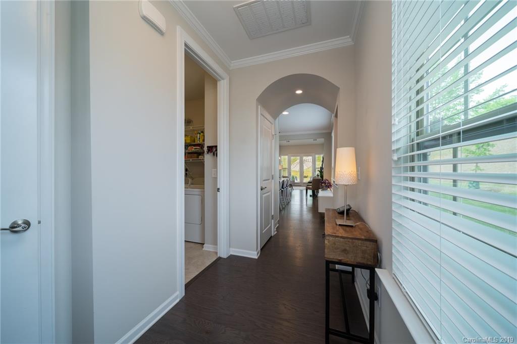 1002 Archibald Avenue Fort Mill, SC 29708 - Photo 6 of 26 a view of a hallway with a livingroom and furniture