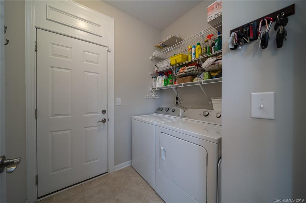 1002 Archibald Avenue Fort Mill, SC 29708 - Photo 8 of 26 a utility room with dryer and washer