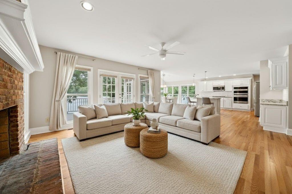 75 Spring Ridge Court Newnan, GA 30265 - Photo 11 of 75 a living room with furniture and a large window