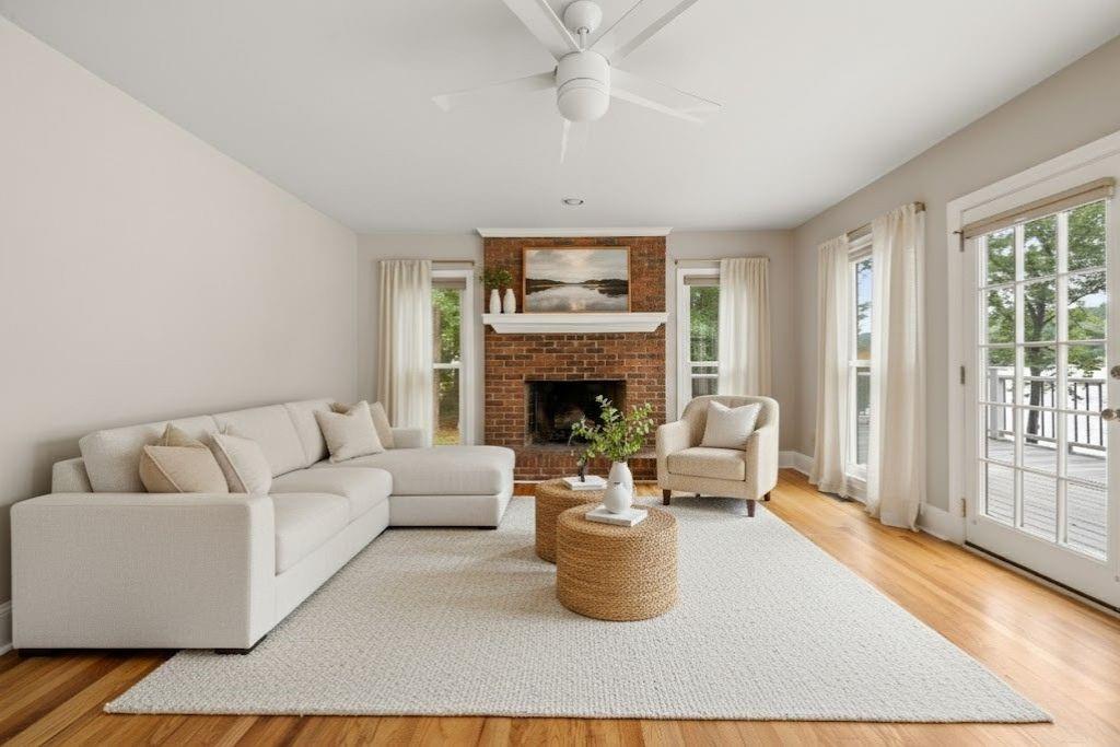 75 Spring Ridge Court Newnan, GA 30265 - Photo 13 of 75 a living room with furniture and a fireplace