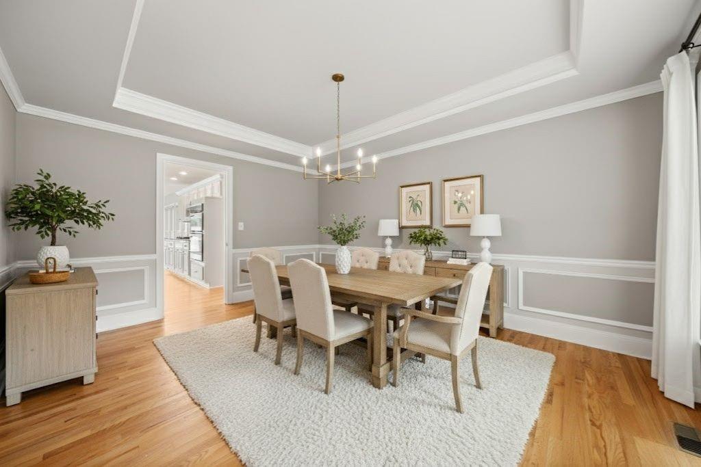 75 Spring Ridge Court Newnan, GA 30265 - Photo 25 of 75 a view of a dining room with furniture window and wooden floor