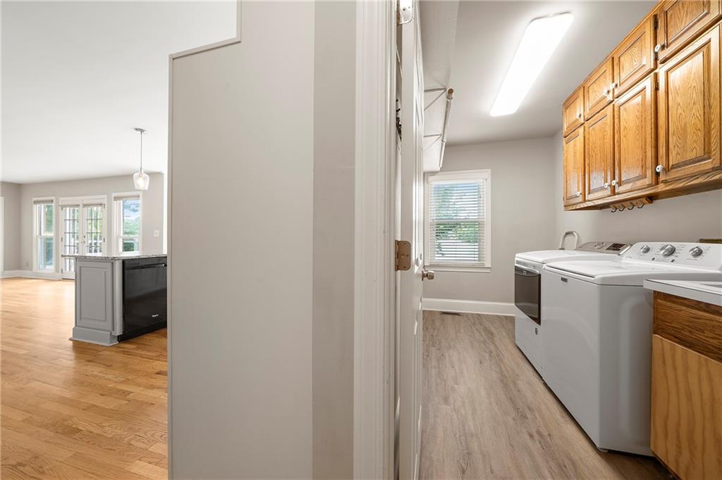 75 Spring Ridge Court Newnan, GA 30265 - Photo 36 of 75 a view of a kitchen with a white stove top oven and sink