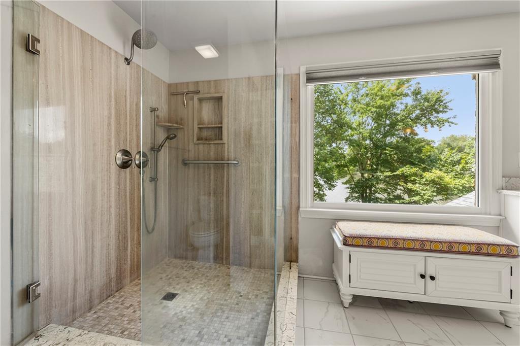 75 Spring Ridge Court Newnan, GA 30265 - Photo 45 of 75 a bathroom with a shower and a window