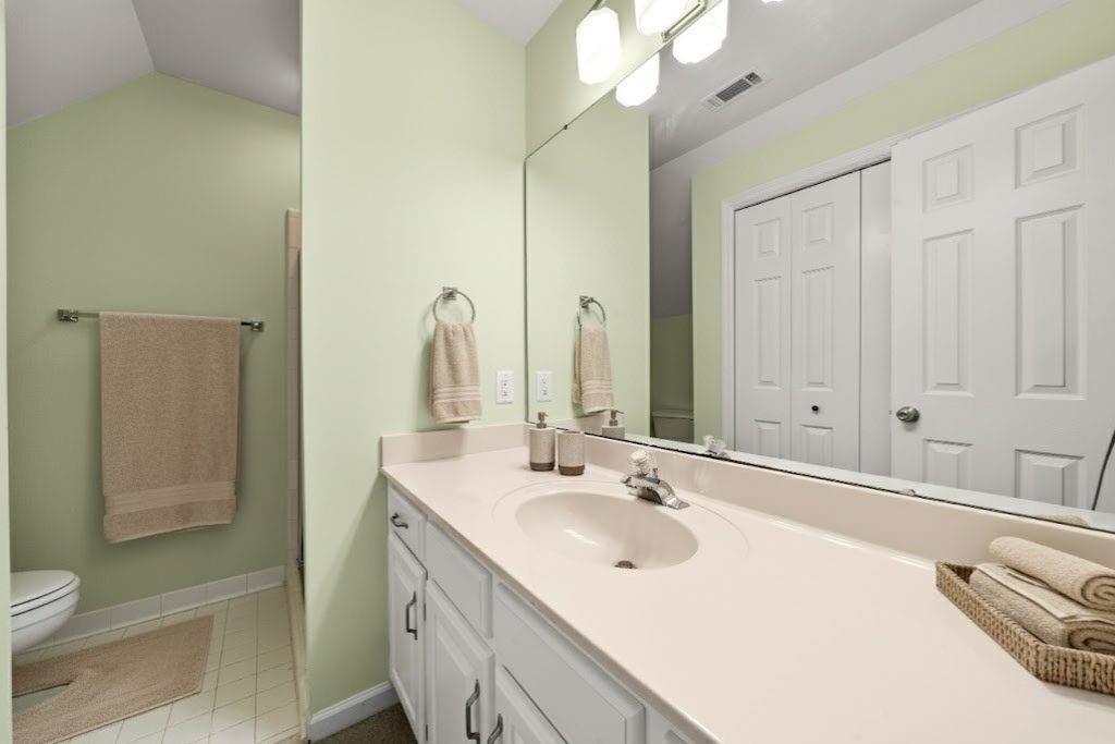 75 Spring Ridge Court Newnan, GA 30265 - Photo 53 of 75 a bathroom with a sink and a mirror