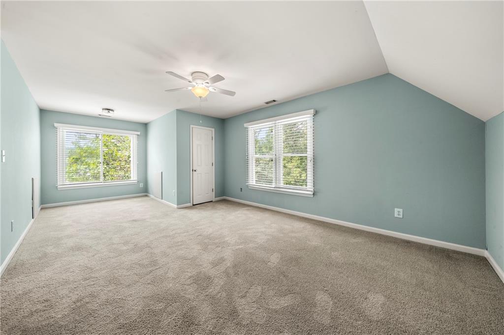 75 Spring Ridge Court Newnan, GA 30265 - Photo 60 of 75 an empty room with windows and closet