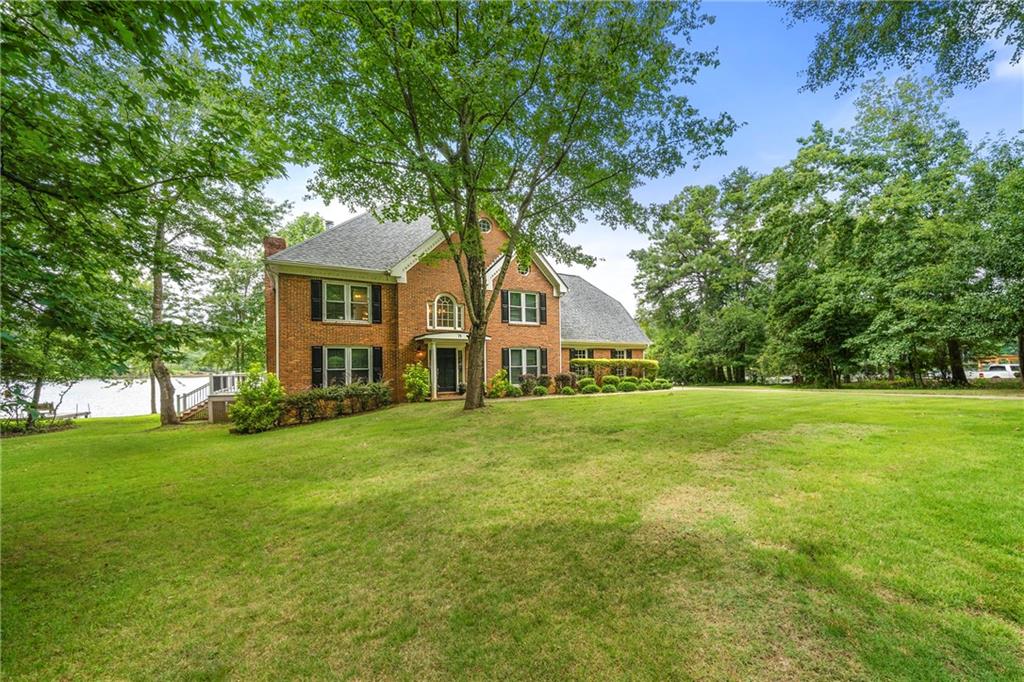 75 Spring Ridge Court Newnan, GA 30265 - Photo 6 of 75 a front view of house with yard and green space