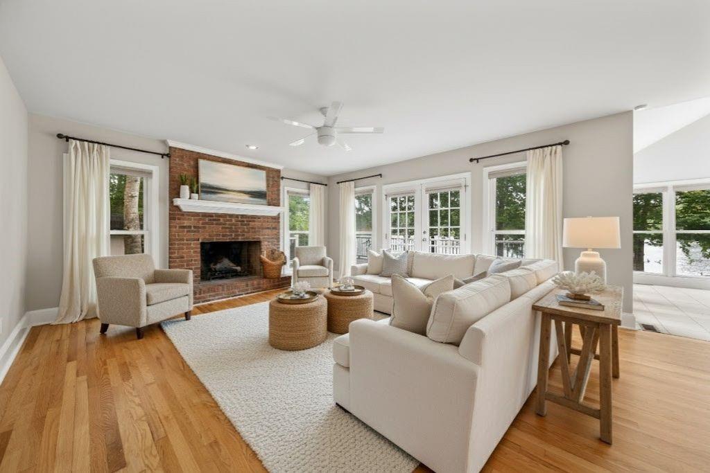 75 Spring Ridge Court Newnan, GA 30265 - Photo 9 of 75 a living room with furniture and a fireplace