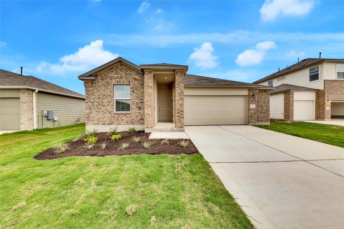 113 River Rise Road Kyle, TX 78640 - Photo 1 of 1 a front view of house with yard