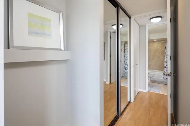 a view of a bathroom from a hallway