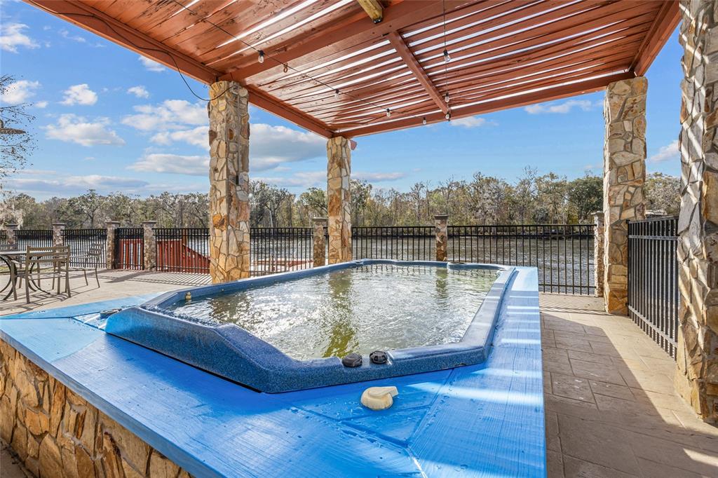 3130 Southwest 86th Way Bell, FL 32619 - Photo 31 of 52 swimming pool view from a balcony