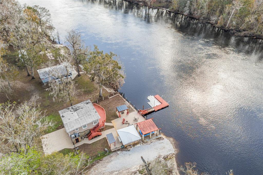 3130 Southwest 86th Way Bell, FL 32619 - Photo 47 of 52 an aerial view of a house with a yard