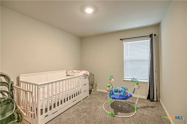 a very nice looking house with a large pool